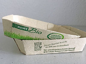 REWE und PENNY testen neuartiges Graspapier für alternative Verpackungen