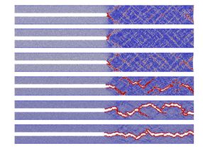 Modelling how fracturing metallic glass releases energy at the atomic level