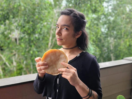 Keisha Harrison, a doctoral student at Oregon State University, with a kombucha SCOBY.