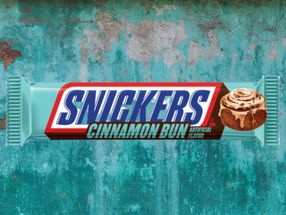 SNICKERS Cinnamon Bun features cinnamon bun flavored nougat, mixed with crunchy peanuts, and topped with buttery caramel, all cloaked in rich milk chocolate.