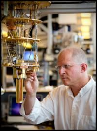 Quantum communication controlled by resonance in 'artificial atoms'