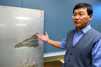 metamaterial that refracts acoustic and elastic waves