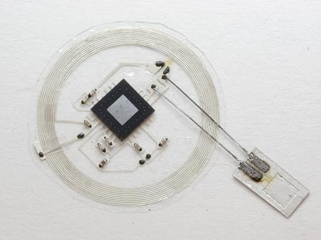 Tiny electronic implants monitor brain injury, then melt away