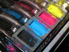 Pulling iron out of waste printer toner