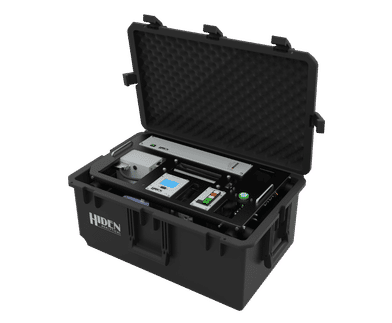 A compact transportable case mounted gas analyser configured for environmental field studies