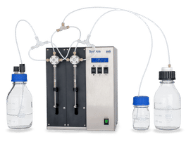 SyrDos™ 2 XLP syringe pump with a 3-directional PTFE valve, an example of two pump drives switched in tandem for continuous feeding