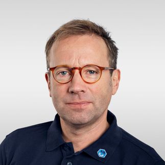 Dr. Christian Schrader